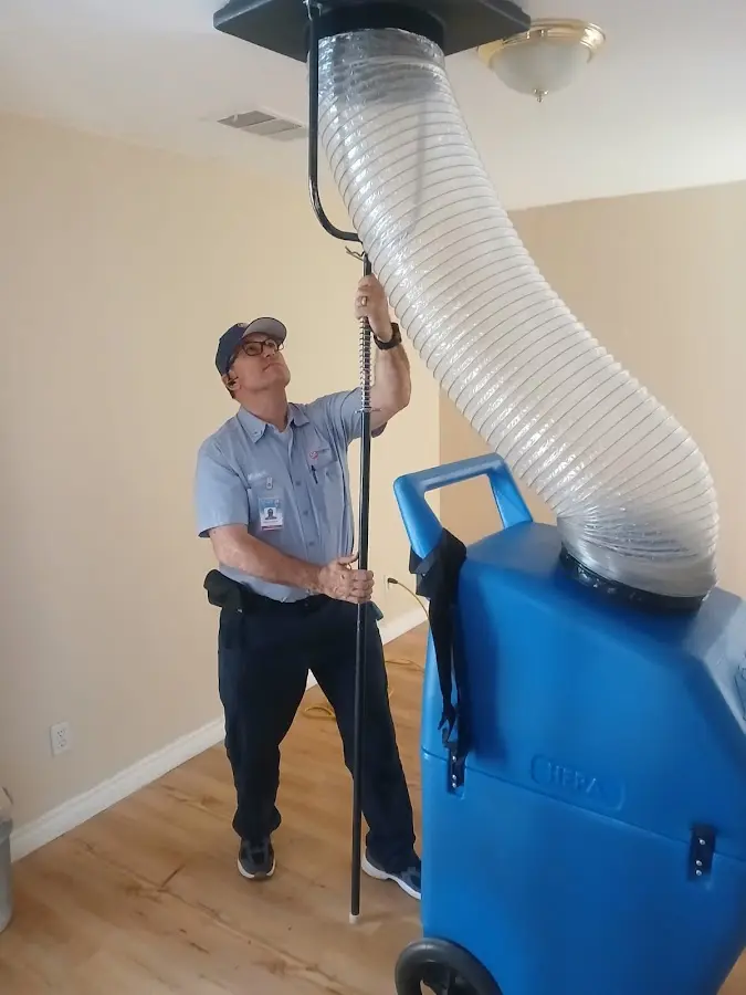 Mini Split Installation technician using HEPA equipment in Reedley