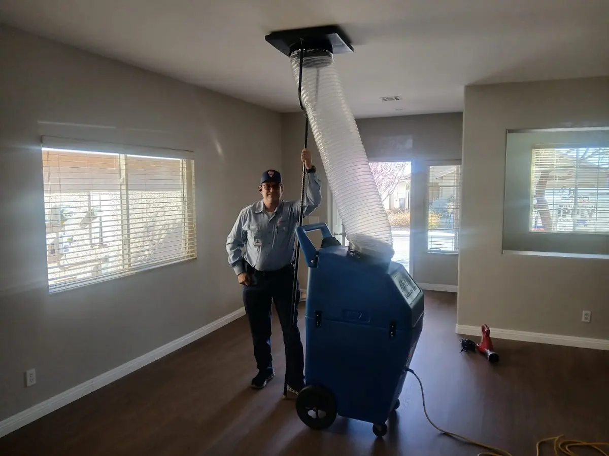 Professional Dryer Vent Cleaning work inside a Reedley home